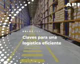 Pasillos de un almacén con estanterías llenas de cajas. La **carretera A23** es clave para una logística eficiente.