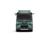 Camión Volvo FMX eléctrico, verde, visto de frente.