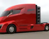 Camiones Nikola, un tractor rojo brillante con diseño futurista, listo para la carretera.